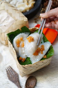 High angle view of hand holding food