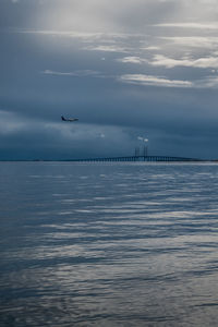 Aeroplane and Øresund bridge seen from amager