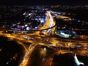 High angle view of light trails on road at night