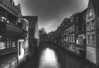 View of canal with buildings in background