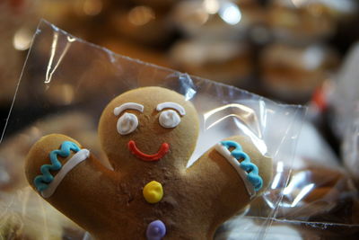 Close-up of gingerbread cookie in plastic