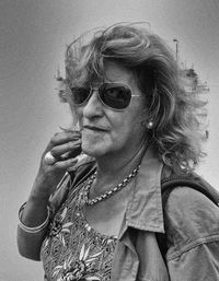 Portrait of woman wearing sunglasses