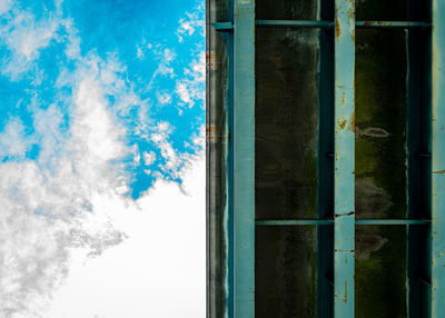 Reflection of building on glass window