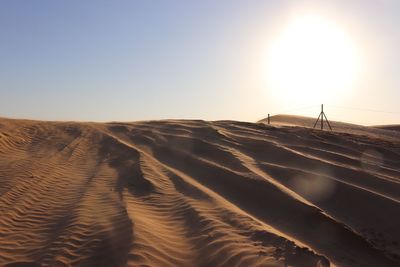 Scenic view of desert against clear sky