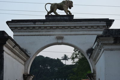 Low angle view of statue against clear sky