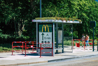 Information sign on footpath in park