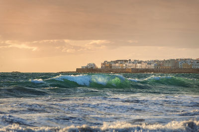 Scenic view of sea against sky during sunset