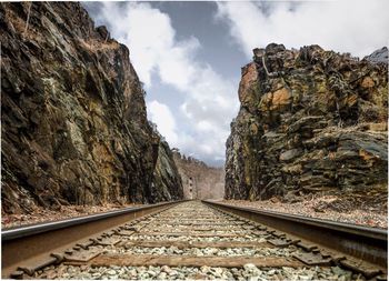 Railroad tracks against sky