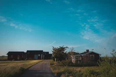 House on field against sky