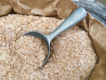 High angle view of wheat bran in paper bag