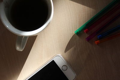 High angle view of coffee on table