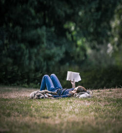 Woman sleeping on grass