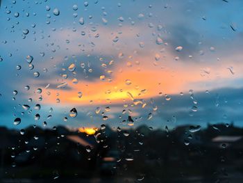 Full frame shot of raindrops on window