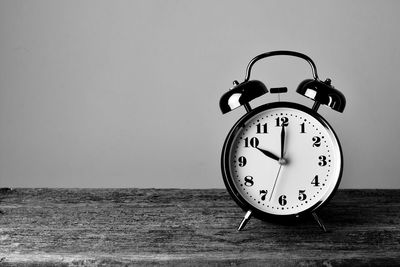 Close-up of clock on sea