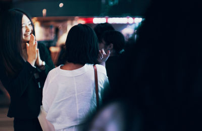 Group of people in the dark
