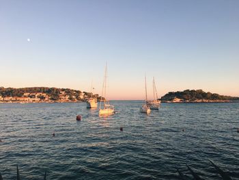 Scenic view of boats in sea