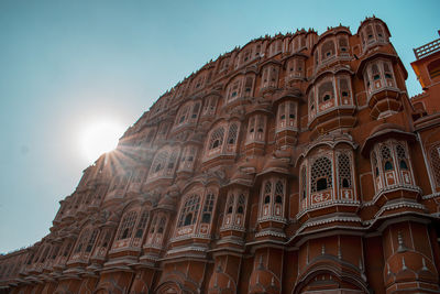 Low angle view of hawa mahal against sun