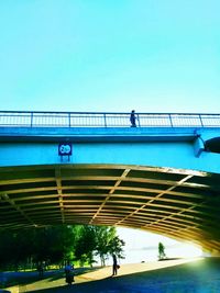 Low angle view of bridge against clear sky