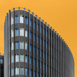 Low angle view of building against sky during sunset