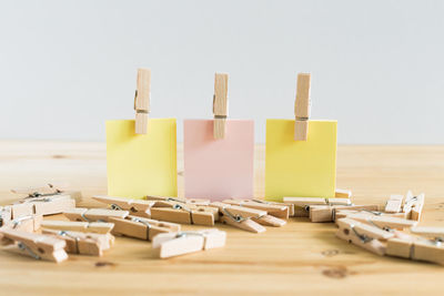 Close-up of pipes on table against white background