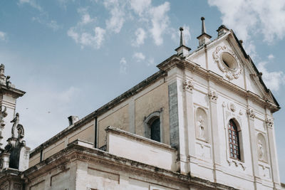 Low angle view of historic building against sky