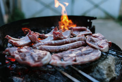 Close-up of meat on barbecue grill