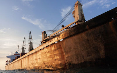 Low angle view of ship against sky