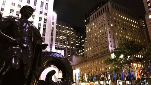 Man in city at night