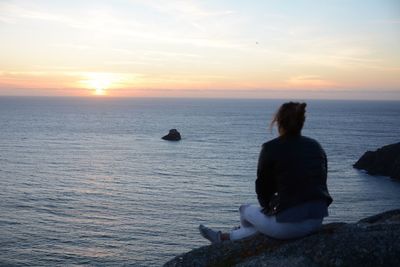 Scenic view of sea at sunset