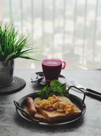 Close-up of breakfast served on table