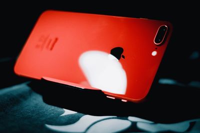 Close-up of telephone booth on table