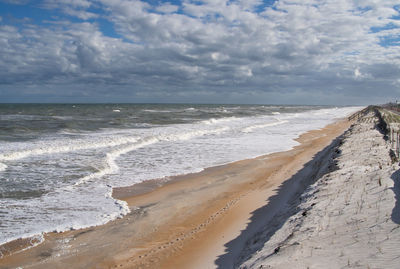 Scenic view of beach against sky