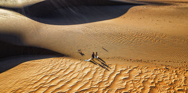 High angle view of man on sand dune