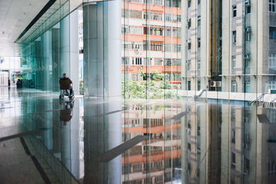 Woman standing in front of building