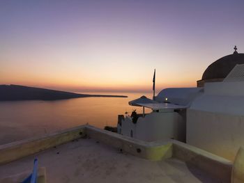 Scenic view of sea against clear sky during sunset