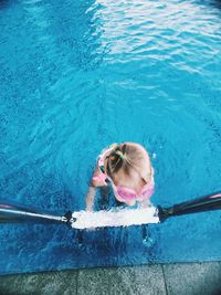 High angle view of woman in swimming pool