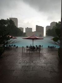 Buildings in city against sky