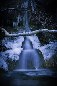 View of waterfall at night