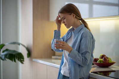 Young woman using mobile phone