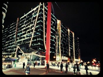 People in city at night