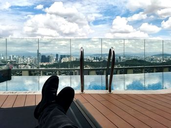 Low section of man in swimming pool