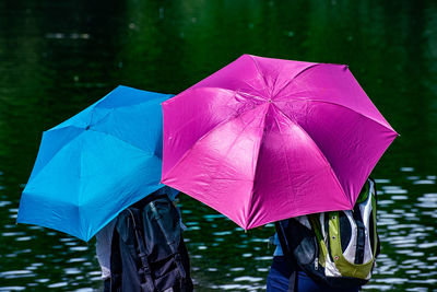 Close-up of wet pink umbrella during monsoon