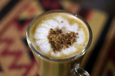 Close-up of cappuccino on table