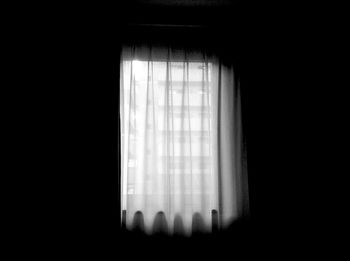 View of curtains in the dark