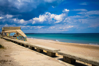 Scenic view of beach against sky