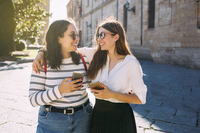 Young woman using mobile phone