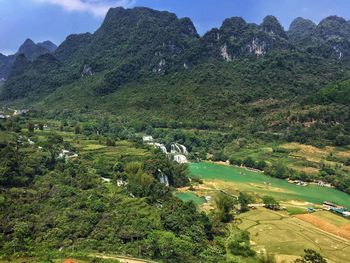 Scenic view of tree mountains against sky