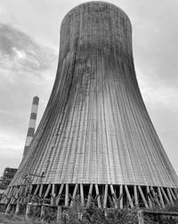 Low angle view of cooling tower 