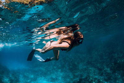 Man swimming in sea