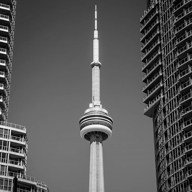 architecture, building exterior, built structure, tall - high, tower, low angle view, city, skyscraper, famous place, capital cities, international landmark, clear sky, travel destinations, modern, tourism, spire, office building, travel, communications tower, tall